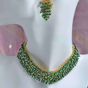 Beaded choker necklace and earring set featuring green stones